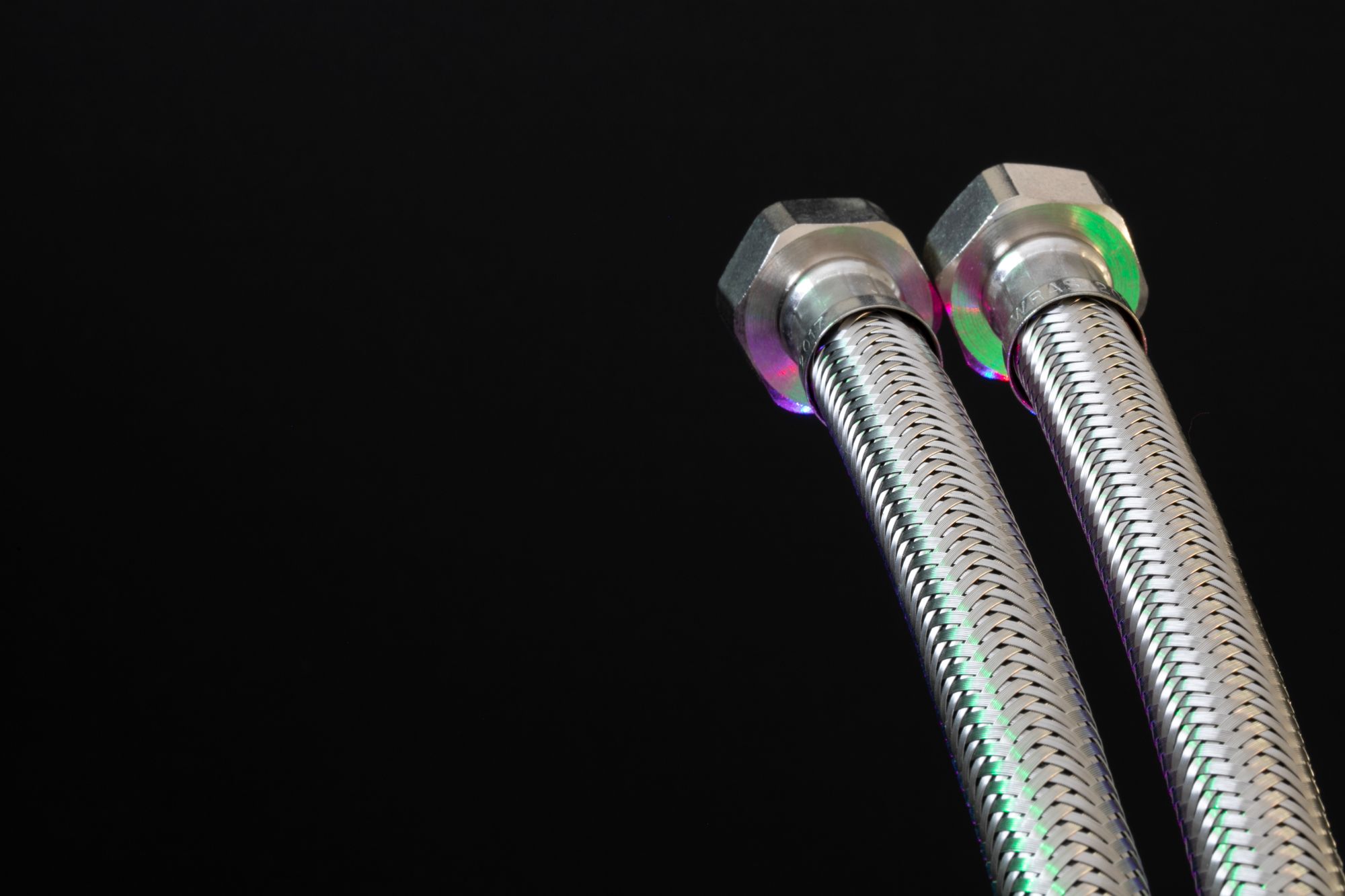 Industrial braided hoses and metal fittings