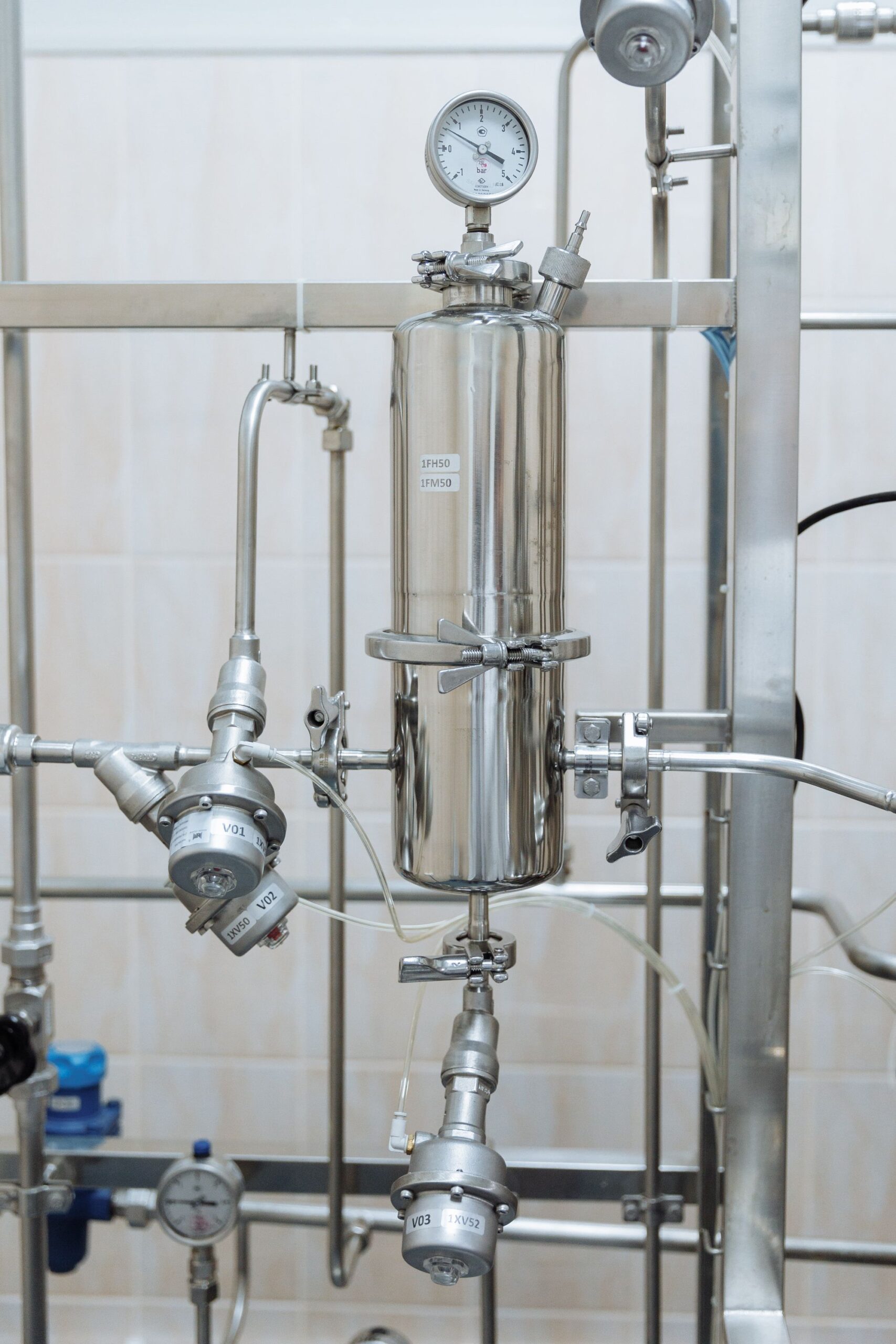 Representative industrial pressure gauges and liquid-handling components