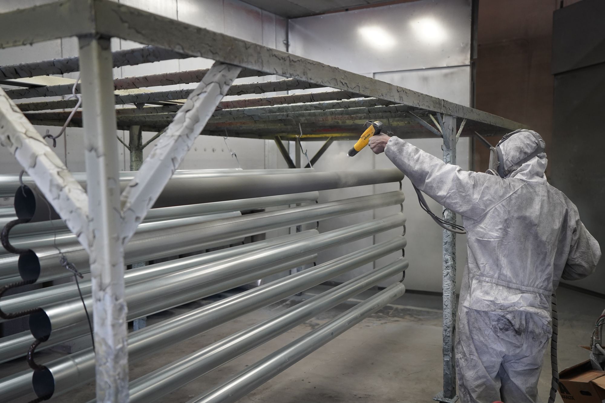 Representative powder coating application in an industrial workshop